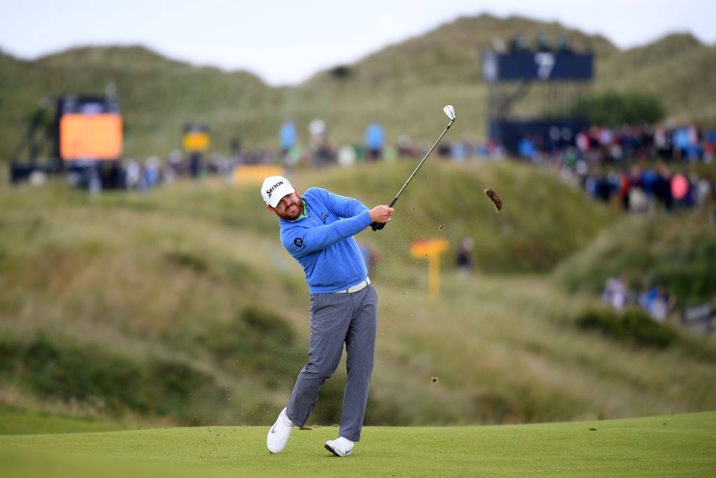 JB Holmes hitting a punch shot at The Open